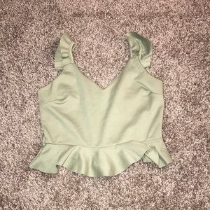 Green peplum style crop top